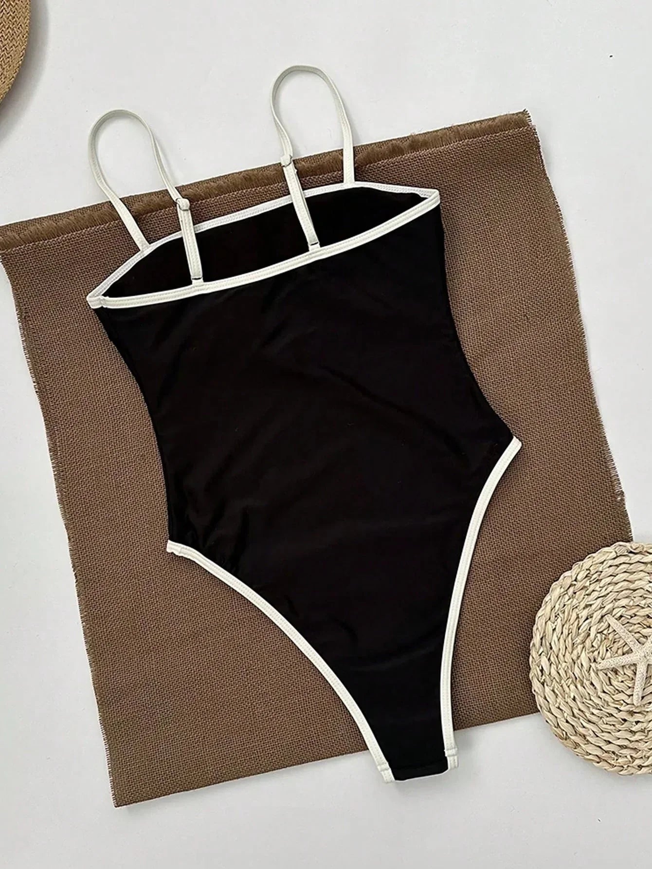 One-Piece Swimsuit in Black with High-Leg Cut and Contrast Detail